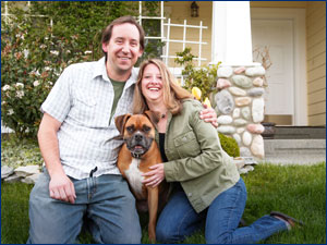 smiling couple with dog
