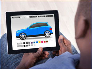 person searching for a car on tablet