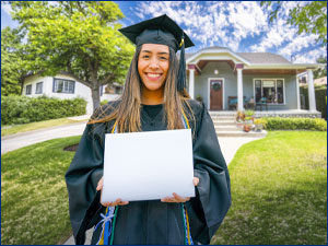 person wearing graduation cap and gown holding a diploma