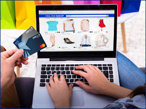 person online shopping with RBFCU credit cards
