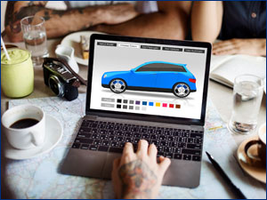 person choosing car color on laptop