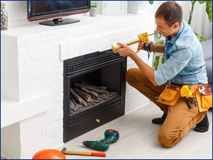 contractor working on fireplace