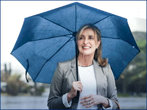 Woman holding an umbrella. 