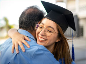 person wearing graduation cap and gown