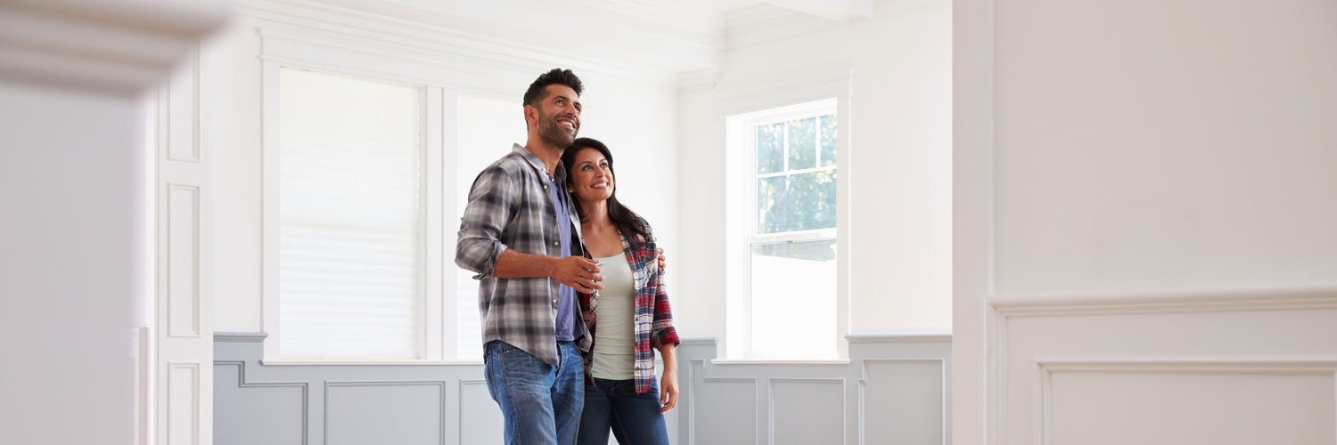 Mortgage-Purchase-Hero A couple inside their home