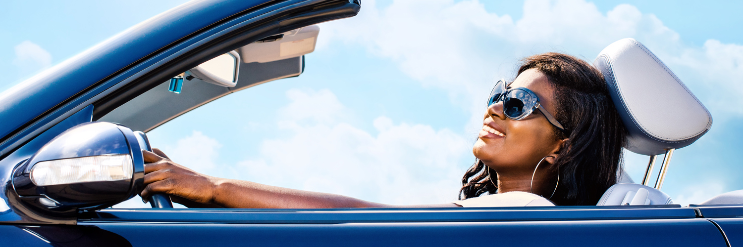 Vehicle Refinancing Person driving a car