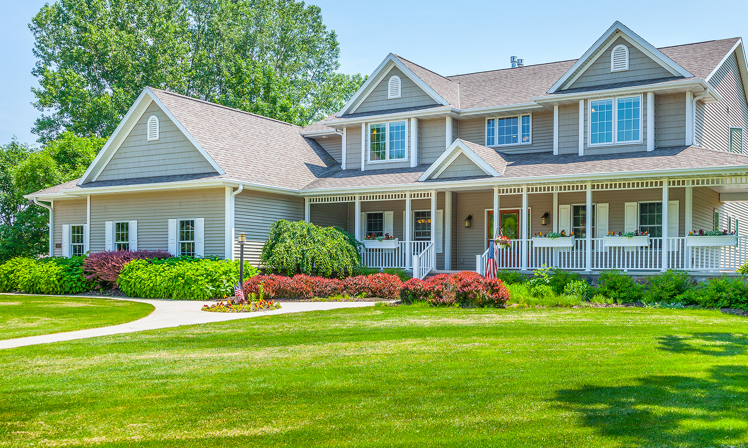 Large home with well-manicured front yard