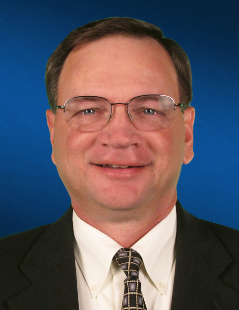 an image of Pete Berridge wearing a suit and tie